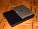 B142 sitting on top of a DELL Inspiron 3500